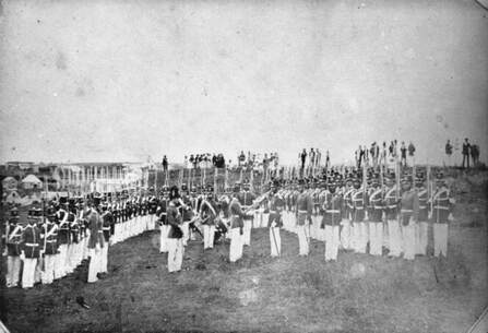 Image of Soldiers of the 65th Regiment on parade in New Plymouth, 1861. Photographer unidentified. 